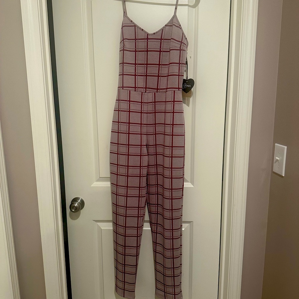 "Burgundy striped jumpsuit, with burgundy jacket